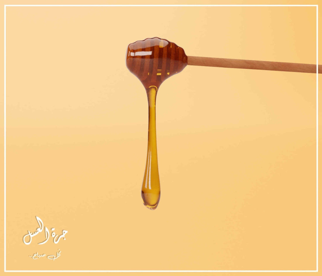 خيط عسل مع ملعقة عسل